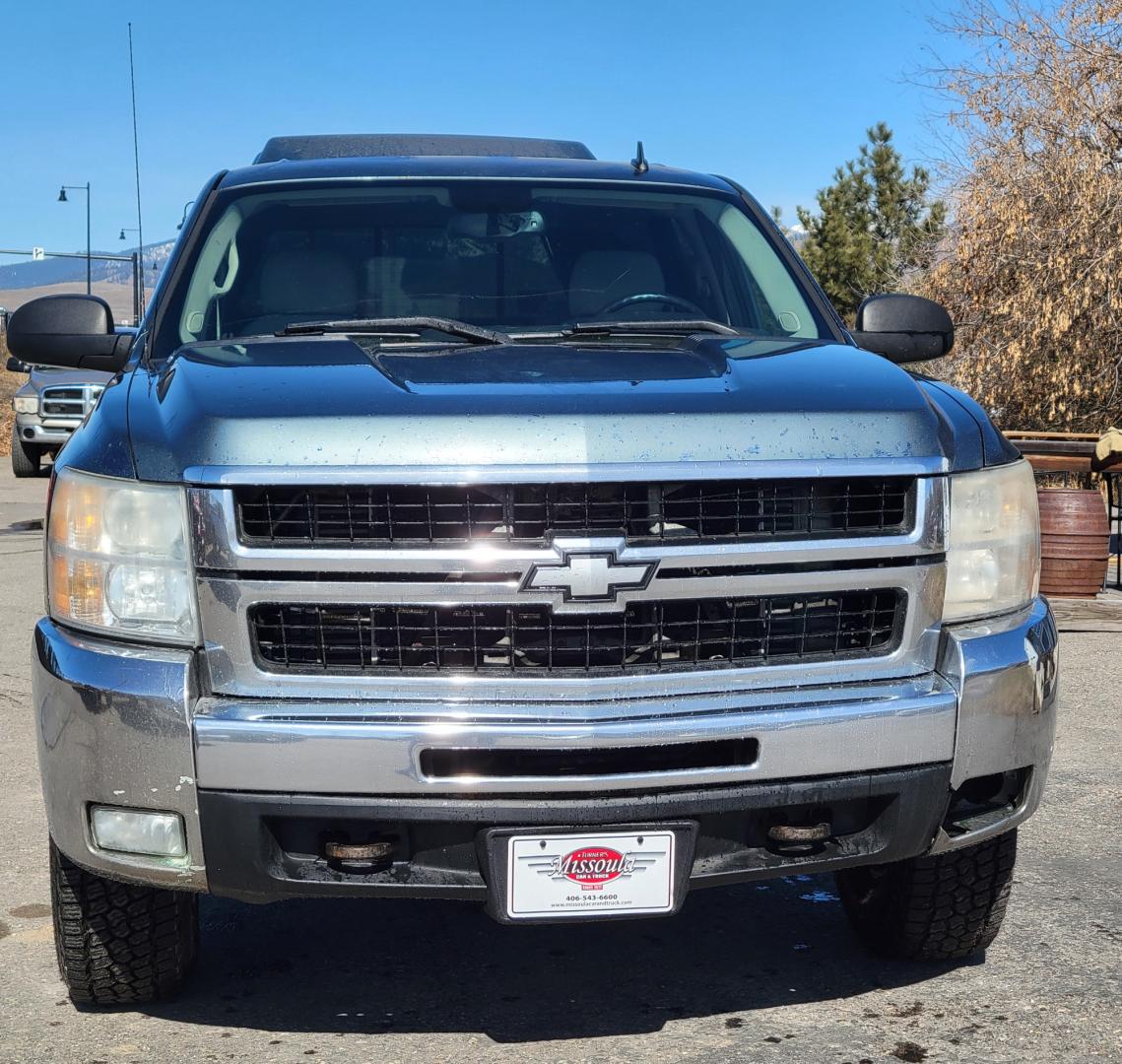 2008 Blue /Tan Chevrolet Silverado 2500HD LT (1GCHK23628F) with an 6.6L engine, 5 Speed Automatic transmission, located at 450 N Russell, Missoula, MT, 59801, (406) 543-6600, 46.874496, -114.017433 - 6.6 Duramax Diesel. Automatic Transmission. 4WD. Matching leer Topper. New Tires. AM FM CD. Power drivers Seat. Air Cruise Tilt. - Photo#2